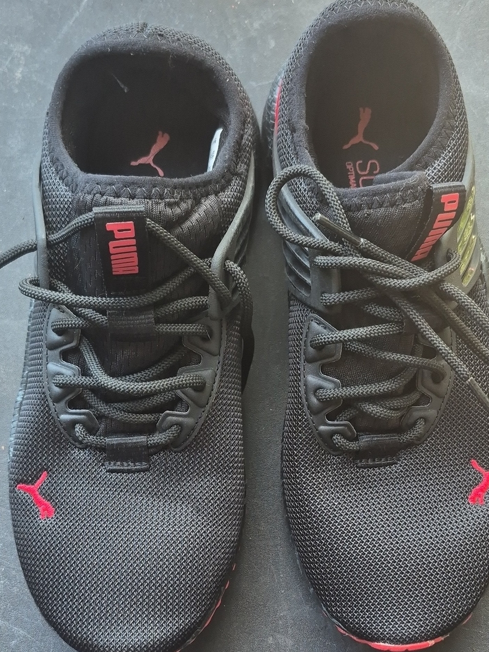 PUMA Men’s Black Athletic Sneakers with Pink Accents